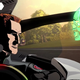 In a still from animated series Parallel Man, a man drives a hover car with a green skull AI avatar floating before him.
